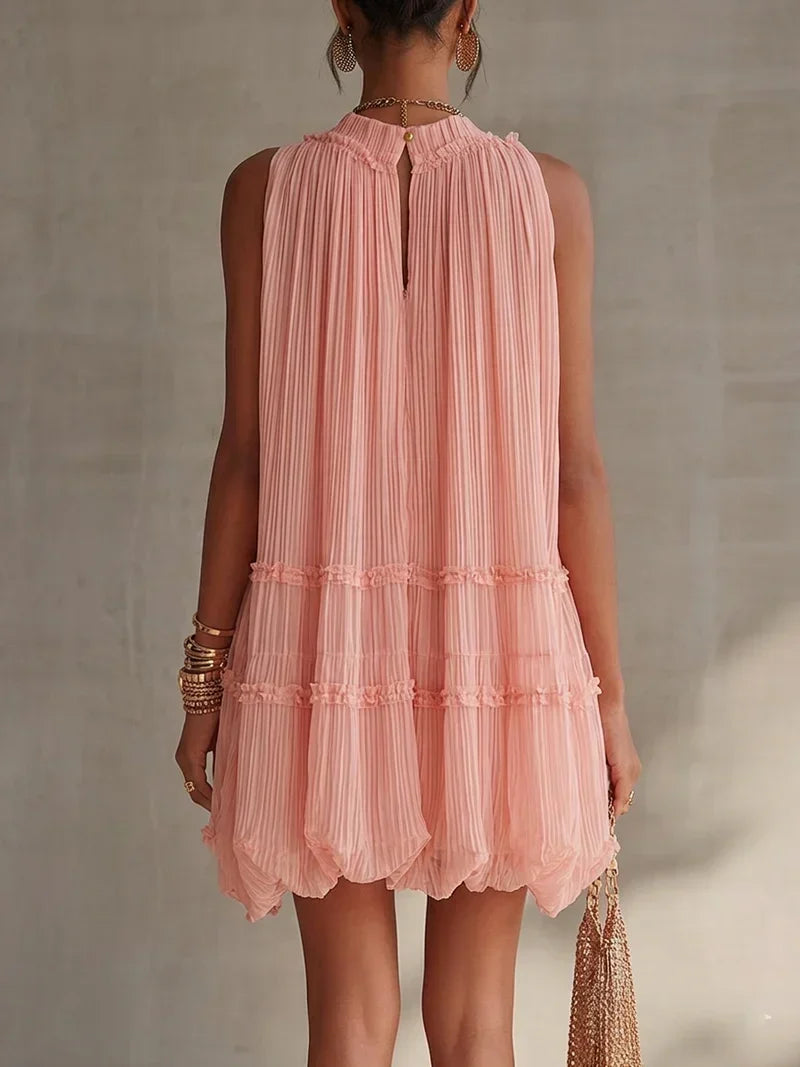 Robe courte Magdalena en mousseline rose à rayures et col dos nu