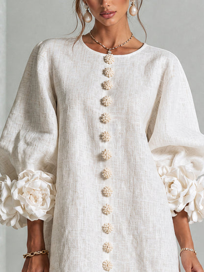 Vestido mini blanco con botones con motivos florales y mangas con motivos florales extravagantes