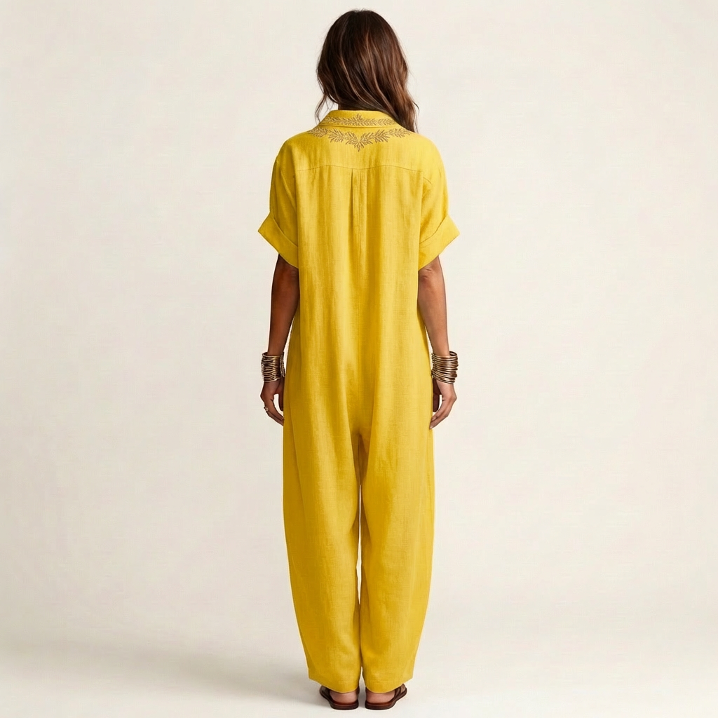 Amarina | Vestido maxi de lino bordado con cuello en V