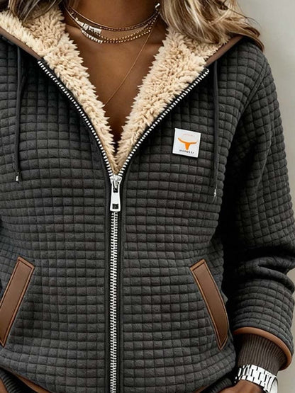 Francesca | Veste à capuche matelassée et douillette